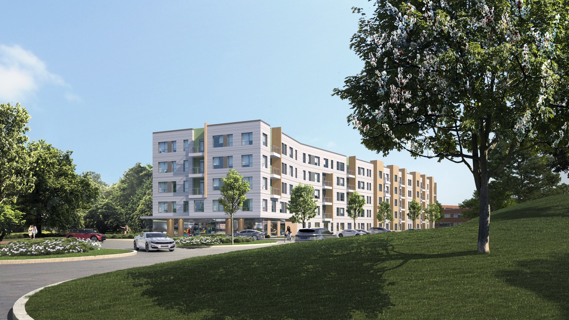 Rendering of a long mid-rise apartment building with white and tan facades behind a curving drive, parked cars, and a grassy slope with a large tree.