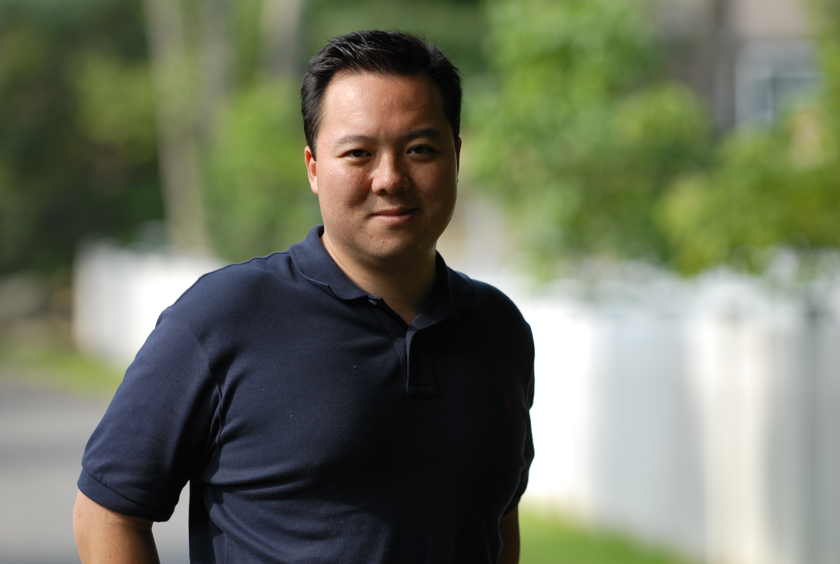William Tong poses outdoors in Stamford, Connecticut.