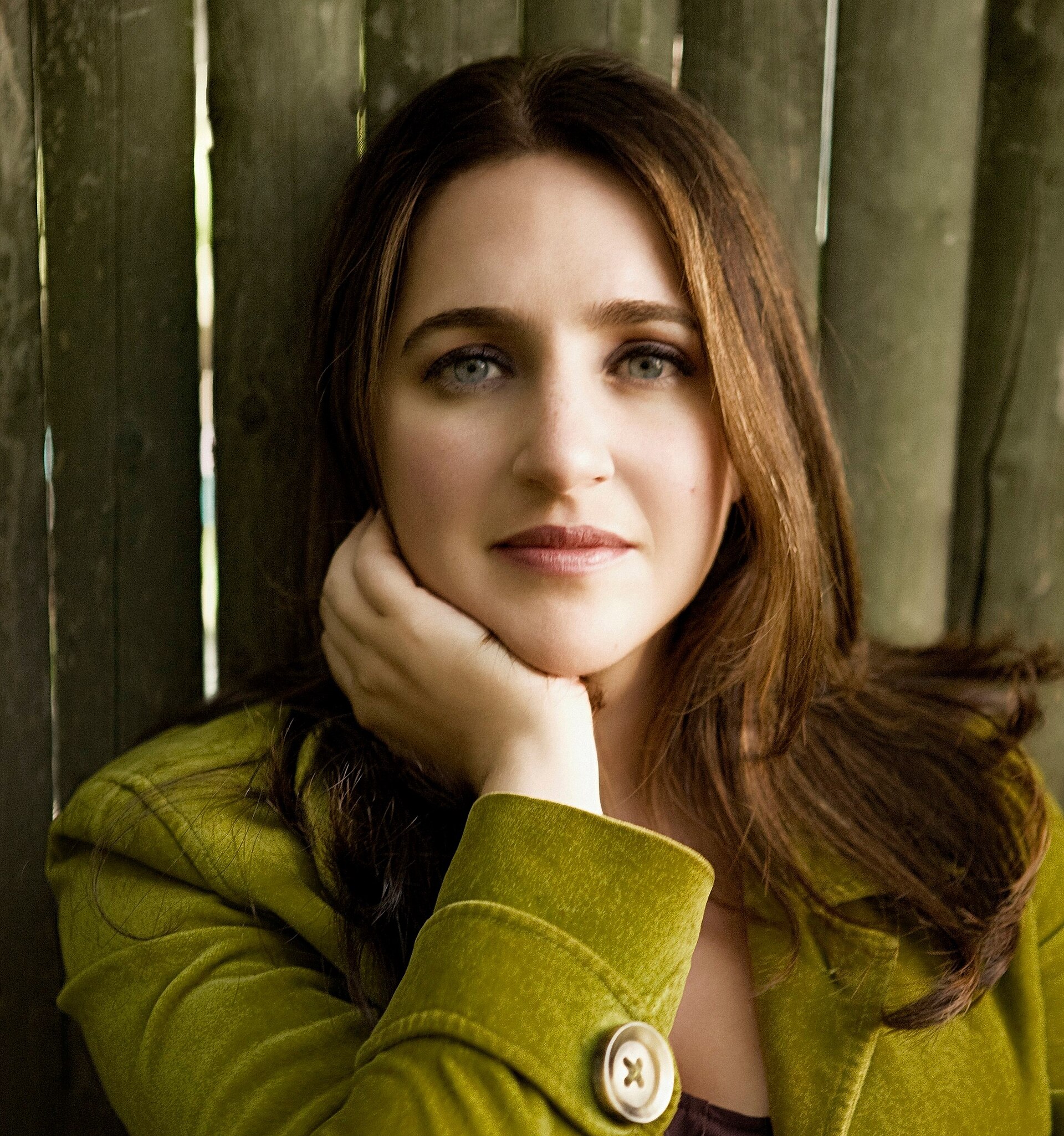 Pianist Simone Dinnerstein in a seated portrait.