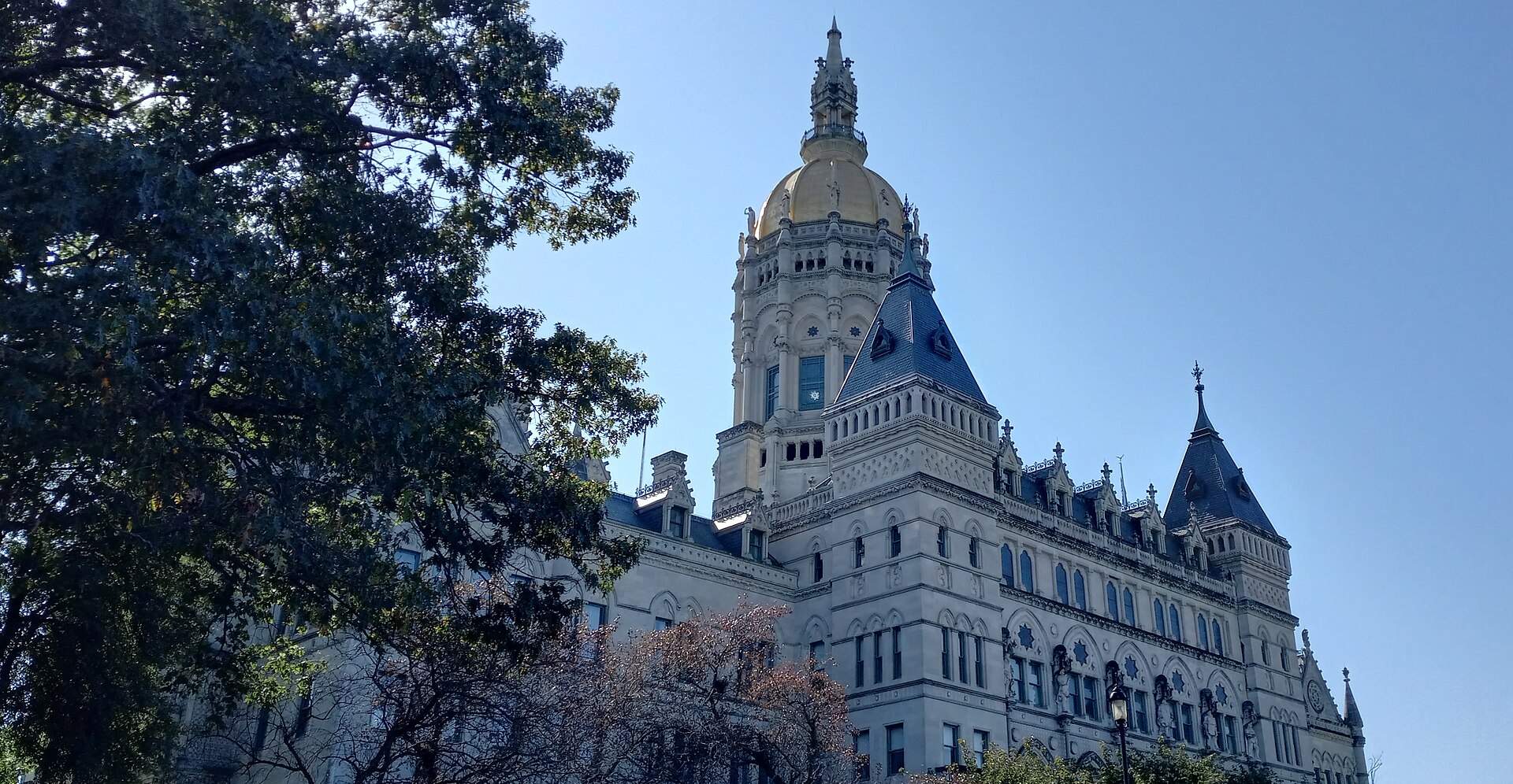 Connecticut State Capitol in Hartford, with its gold dome above the stone facade.