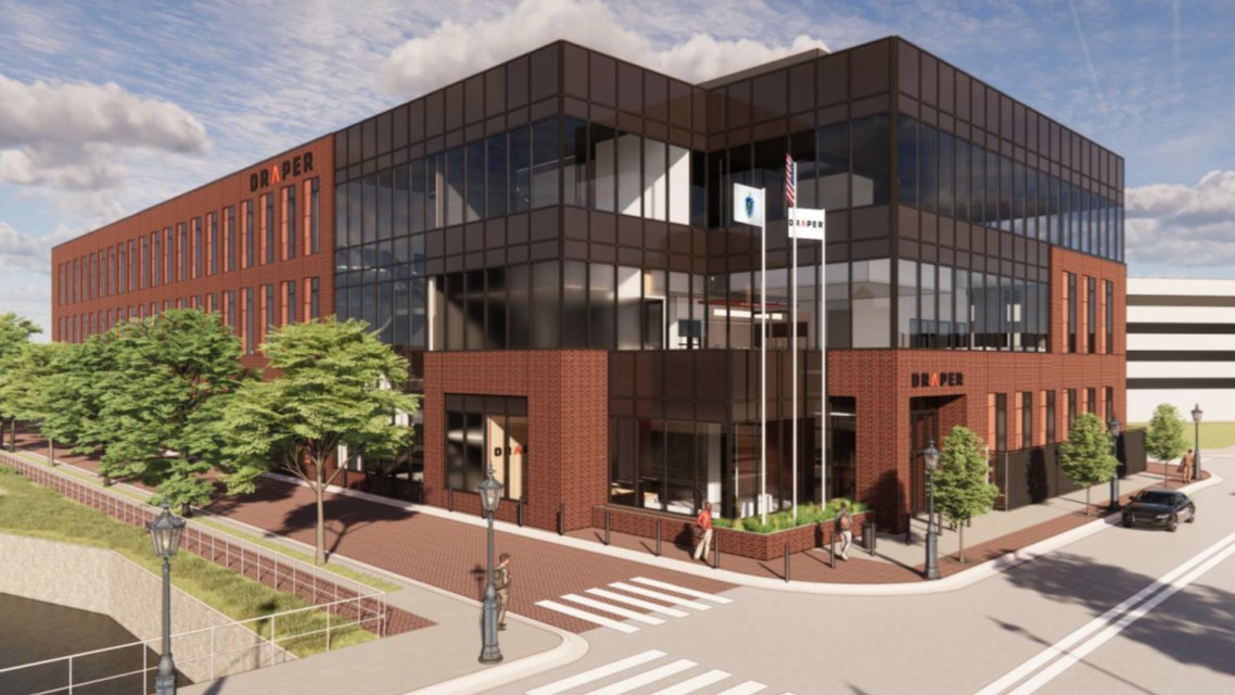 A rendering shows a three-story brick and dark-glass building with Draper signs, flagpoles and young trees at a street corner beside a canal.