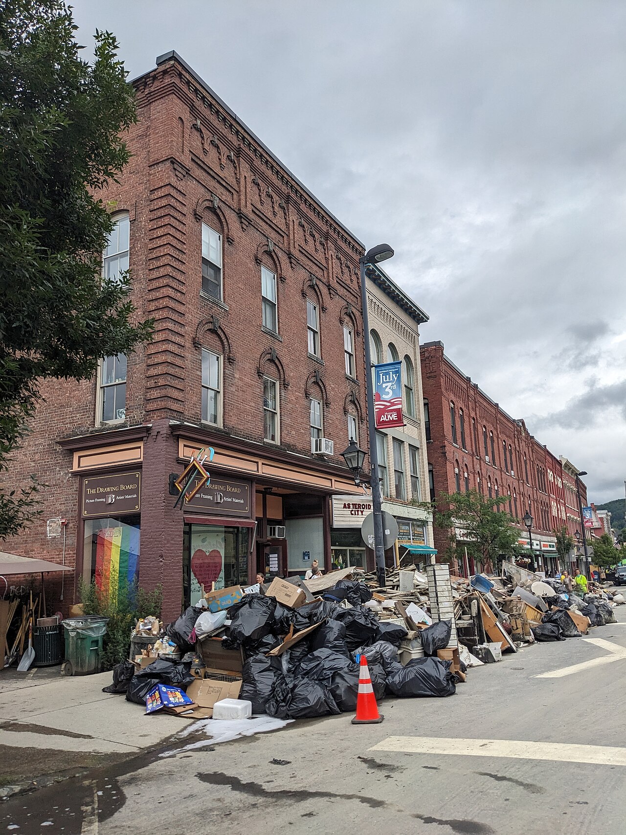 Flood cleanup debris along Main Street in Montpelier, Vermont.