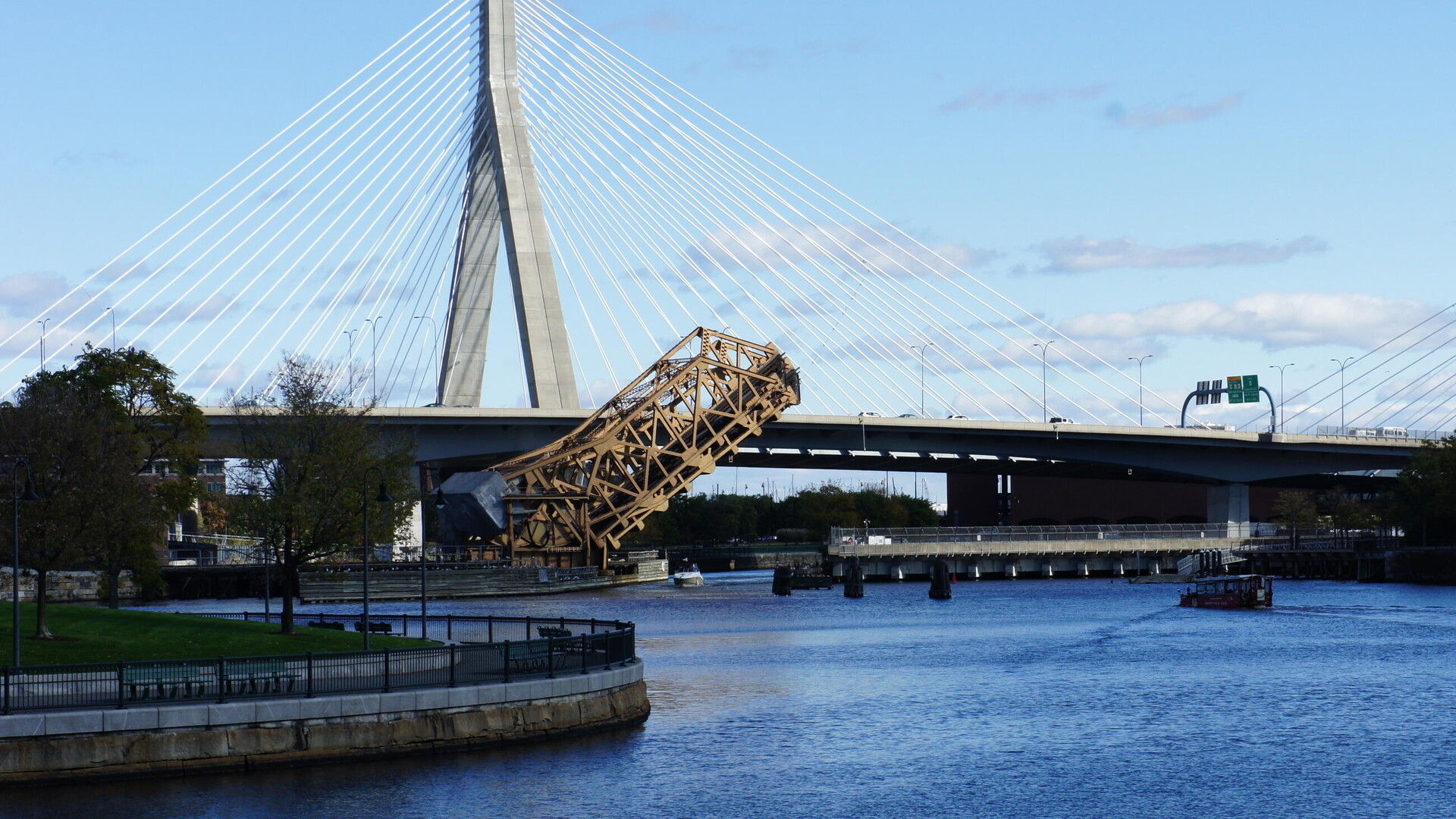 MBTA North Station drawbridge over the Charles River with water and surrounding tracks.