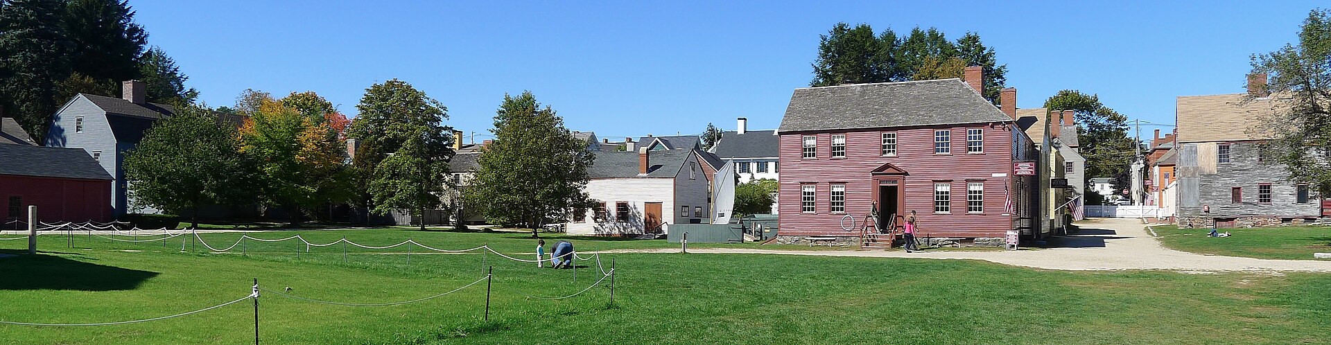 Historic houses and a green at Strawbery Banke Museum.